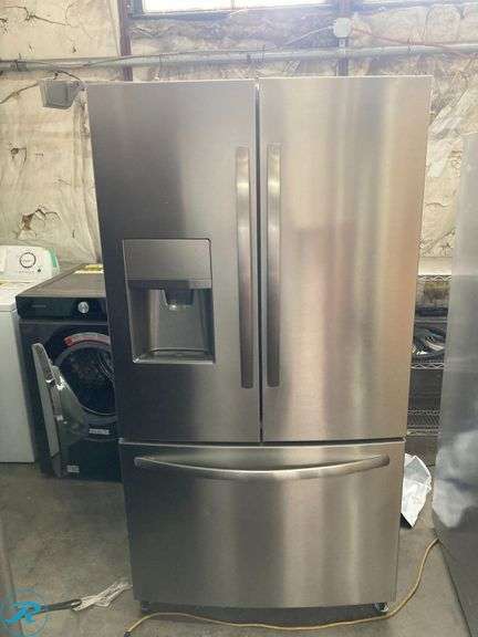 (1) Frigidaire Counter-Depth 21.7-cu ft 3 -Door French Door Refrigerator with Ice Maker with water and Ice dispenser ( EasyCare Stainless Steel ) ENERGY STAR Certified (some minor scratches and minor dents and cracks  on the plastic holders Please see photos) - Roller Auctions
