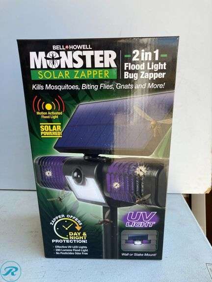 (4) New- BELL + HOWELL 110 -Degree 3 -Wattage Equivalent Solar LED Black 1 -Head Motion-Activated Flood Light with Timer (total of 4) - Roller Auctions