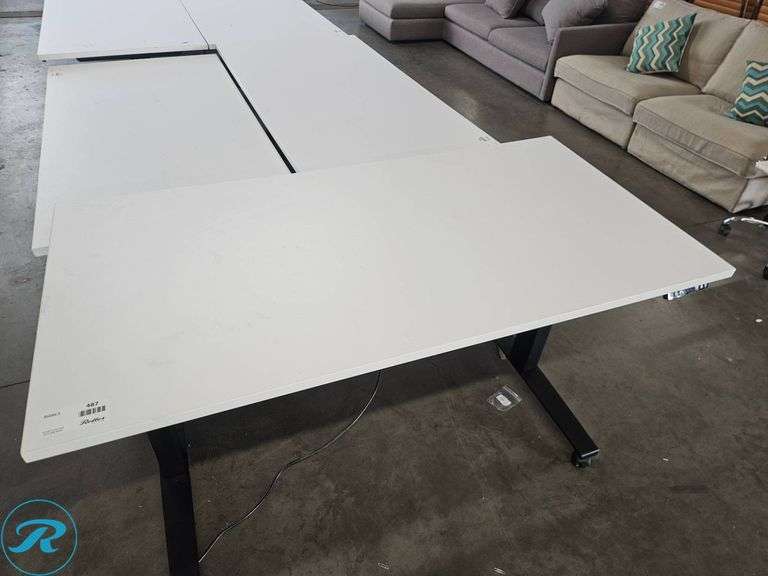 Electric Height-Adjustable Desk with White Top and Black Base, 60×30 Inches - Roller Auctions