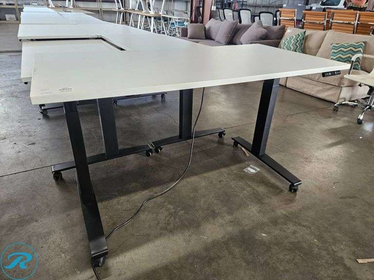 Electric Height-Adjustable Desk with White Top and Black Base, 60×30 Inches - Roller Auctions