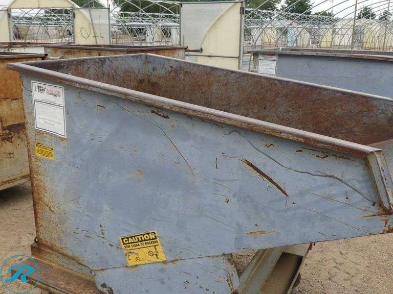 Self-Dumping Hopper with Casters and Fork Pockets - Roller Auctions