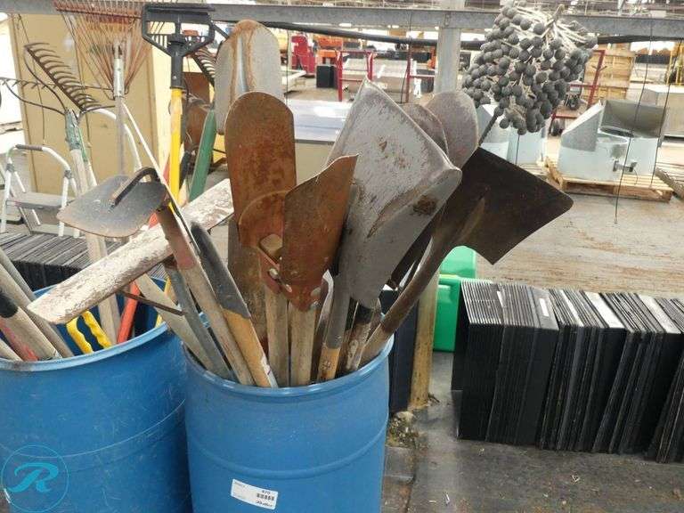 (3) Barrels of Garden and Yard Tools Including Rakes, Shovels, and Hoes - Roller Auctions