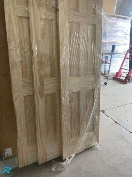 (3) New- Reliabilt 24" x 80" 6-panel solid core unfinished pine wood door (all 3 have damage on side see photos) (Total of 3 doors) - Roller Auctions