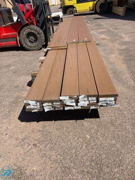 (30) New- (23) Trex Transcent Linage 1" x 6" x 20ft Jasper square composite Deckboard (4) Fiberon Good Life 3/4" x 7.25" x 12ft Cabin square composite riser (3) Trex Transcent Linage 1" x 12" x 12ft Jasper composite Fascia Board - Roller Auctions