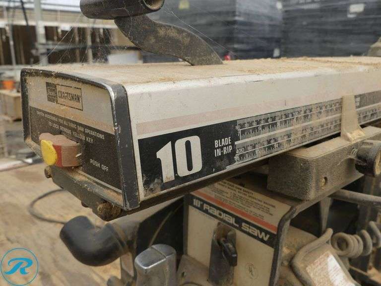 Sears Craftsman 113.197751 10″ Radial Arm Saw with Wood Bench, 8′ x 2′ - Roller Auctions