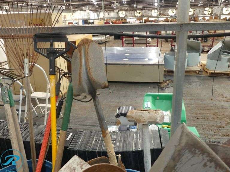 (3) Barrels of Garden and Yard Tools Including Rakes, Shovels, and Hoes - Roller Auctions