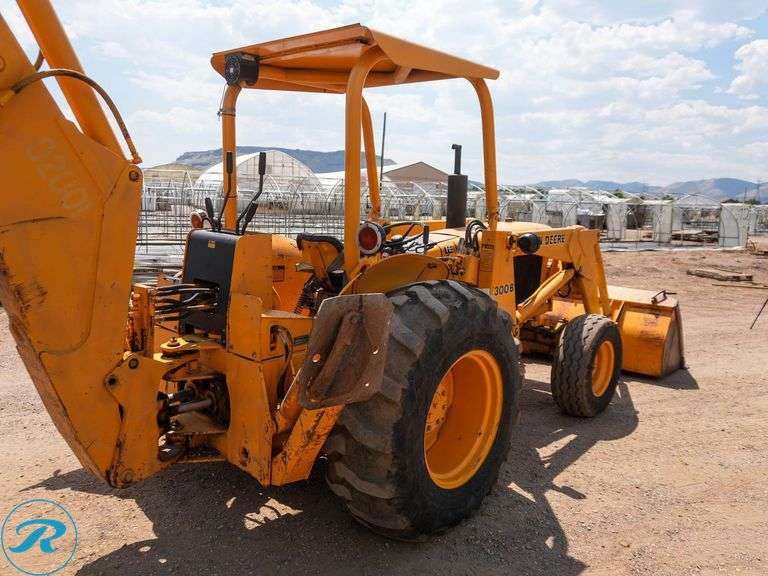 John Deere  300B  Loader Backhoe - Roller Auctions