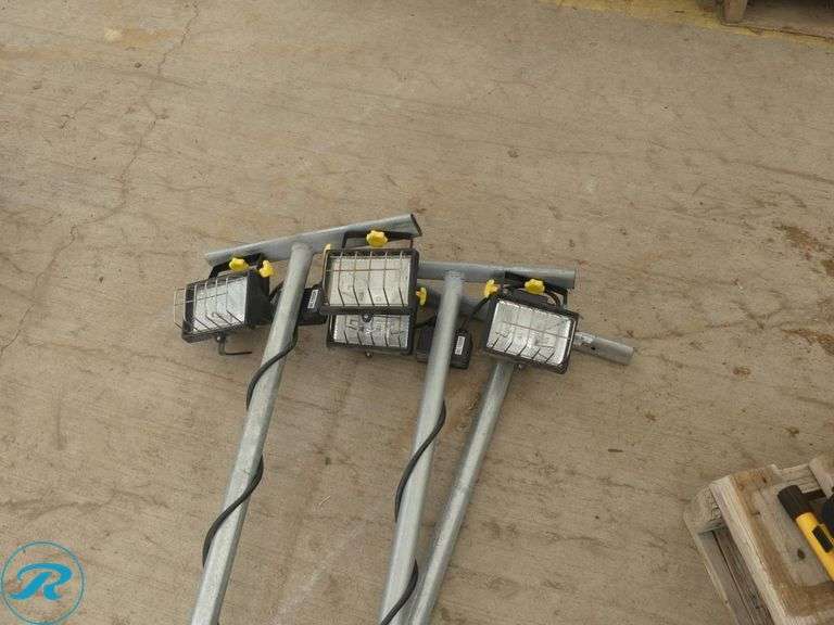 (3) Mounted Work Lights on Metal Poles - Roller Auctions