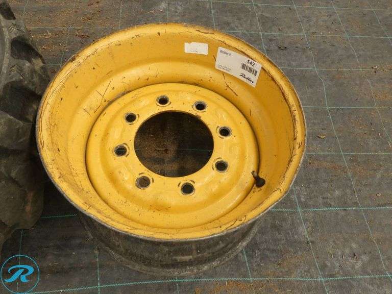 Galaxy Mud Buddy 10 x 16.5 Skid Steer Tire With (2) Wheels to Fit Caterpillar - Roller Auctions