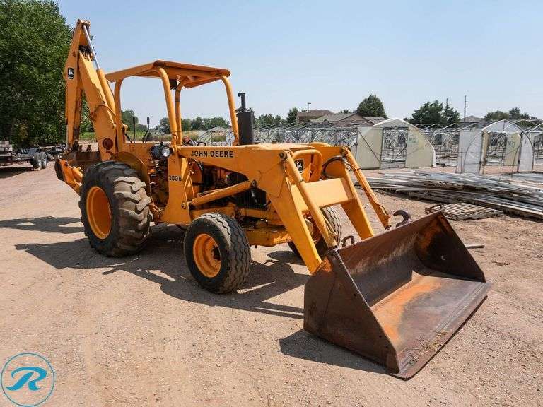 John Deere  300B  Loader Backhoe - Roller Auctions