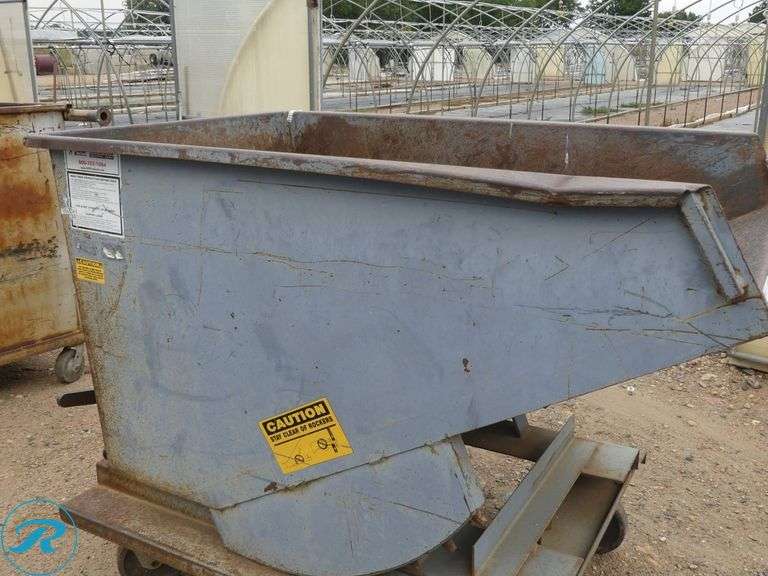 Self-Dumping Hopper with Casters and Fork Pockets - Roller Auctions