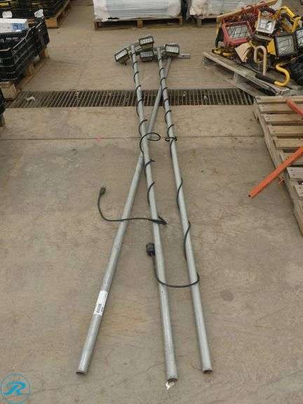 (3) Mounted Work Lights on Metal Poles - Roller Auctions