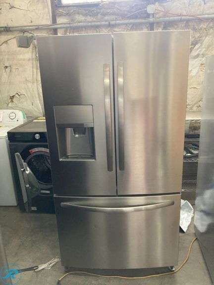 (1) Frigidaire Counter-Depth 21.7-cu ft 3 -Door French Door Refrigerator with Ice Maker with water and Ice dispenser ( EasyCare Stainless Steel ) ENERGY STAR Certified (some minor scratches and minor dents and cracks  on the plastic holders Please see photos) - Roller Auctions