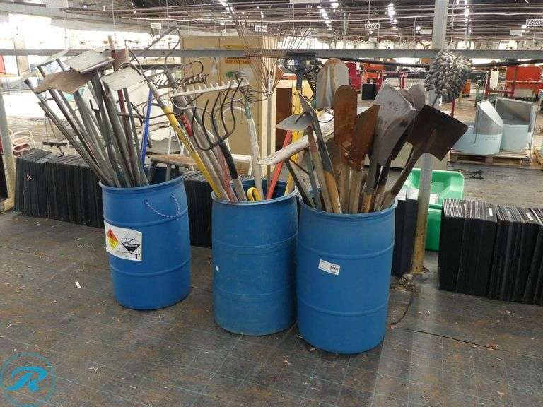 (3) Barrels of Garden and Yard Tools Including Rakes, Shovels, and Hoes - Roller Auctions