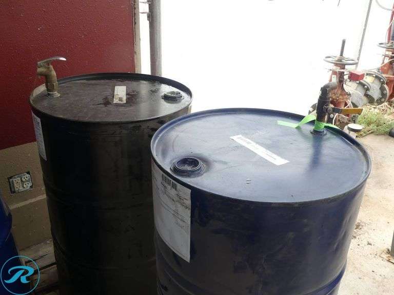 (4) 55-Gallon Drums With Ball Valve Dispensers, (3) Empty and Valvoline Hydraulic Oil 3/4 Full - Roller Auctions
