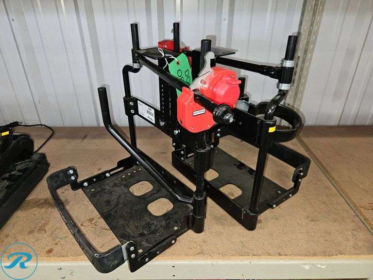 (2) Equipment Defender Trimmer Racks - Roller Auctions