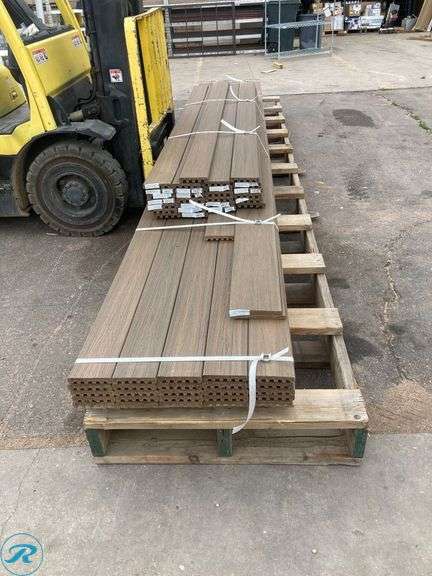 (54) Deck boards (25) Trex Enhance Naturals 1" x 6" x 16ft Toasted Sand Sq composite Deck board (27) Trex Enhance naturals 1" x 6" x 8ft Toasted Sand Square composite Deck board (2) Trex Enhance Natural 1" x 7" x 12ft Composite Toasted Sand Fascia Deck Board (total of 54 boards) - Roller Auctions