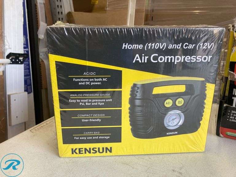 (2 items) (1) Kensun Air Compressor and (1) Black Jack Torn Black 2-ton - Roller Auctions