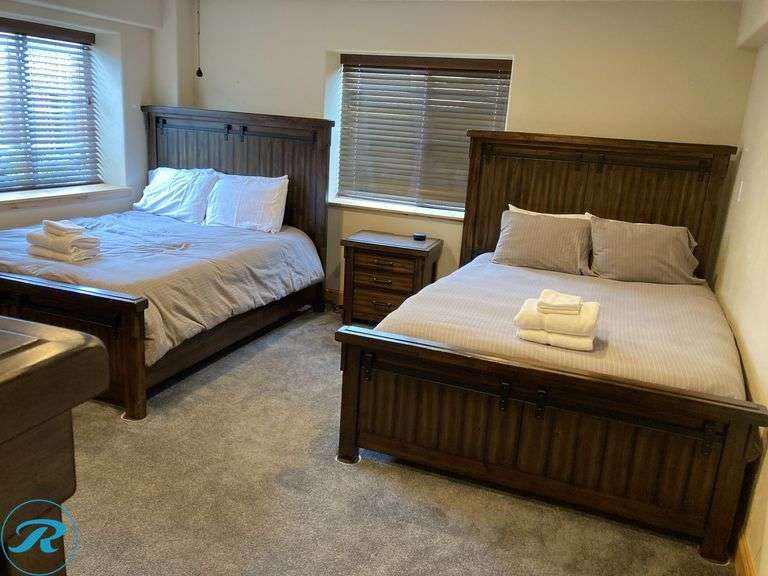 (4) Queen Beds (2) Night stand (1) and arm chair and 1 chest of drawers - Roller Auctions