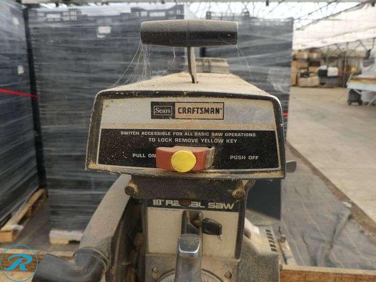 Sears Craftsman 113.197751 10″ Radial Arm Saw with Wood Bench, 8′ x 2′ - Roller Auctions