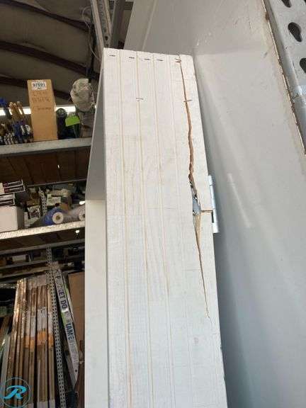 (1) New- Reliabilt 36" x 80" x 6 9/16" Steel no glass right hand Inswing primed prehung front door with Brickmould insulating core (some damage in frame see Photos) (Total of 1) - Roller Auctions