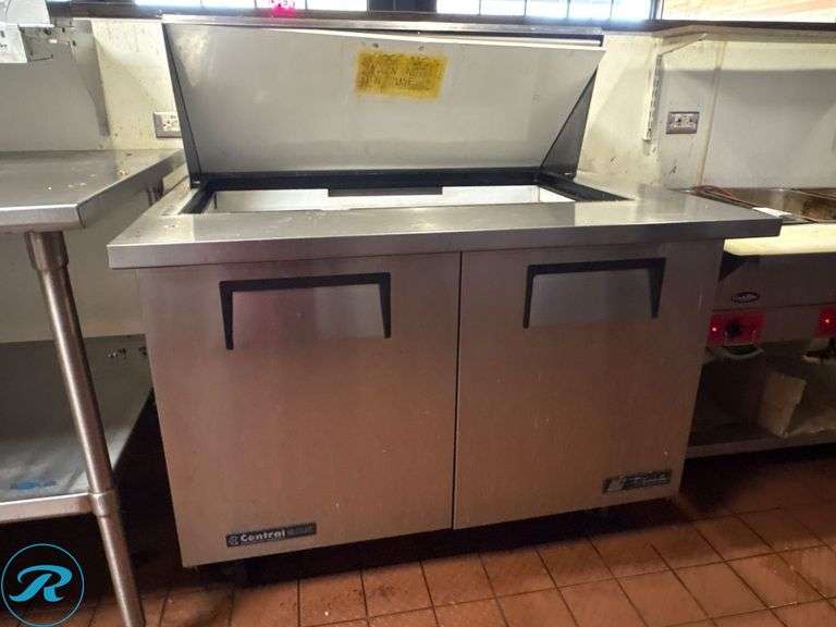 True TSSU-48-18M-B 2-Door Mega Top Refrigerated Sandwich Prep Table on Casters