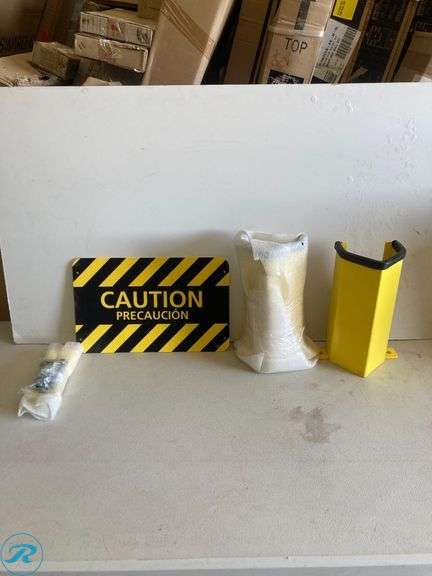 (Set of 2) Pallet of racking post guard protectors 12" and predrilled holes and caution sign - Roller Auctions