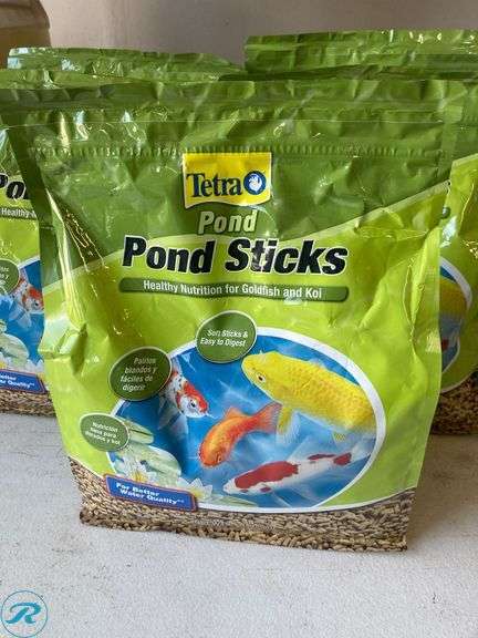 (7) New- (5) Tetra 1lb goldfish and koi 11.25" x 9.5" x 4.75 in green fish food (1) smart pond 12.3" x 63" x 63" black plastic pond pump filter box (1) Pennington 1000 gph submersible corded electric pond pump - Roller Auctions