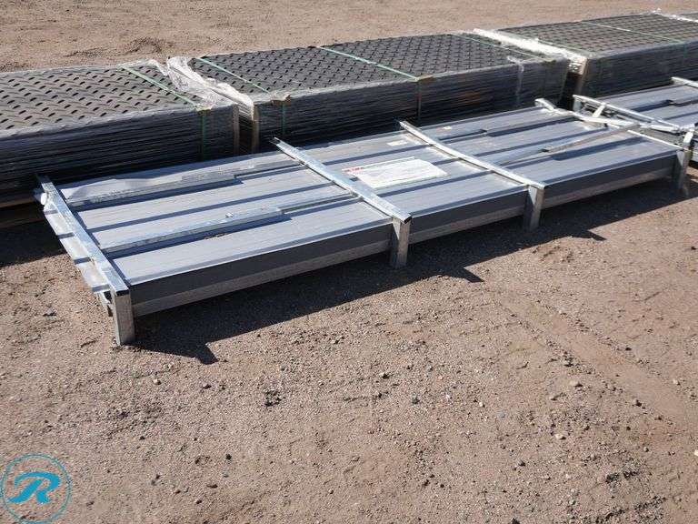 (100) New Sheets of KJ K0311 Galvalume Corrugated Steel Panels, 10' x 35" (Top Few Panels Damaged) - Roller Auctions