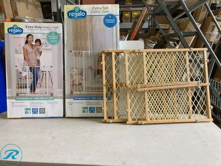 (4) Regalo safety gates including (1) extra wide 29-38" x 36" (1) extra tall 38.5" x 36" (2) Wooden Expanding gates - Roller Auctions