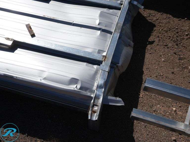 (100) New Sheets of KJ K0311 Galvalume Corrugated Steel Panels, 10' x 35" (Top Few Panels Damaged) - Roller Auctions