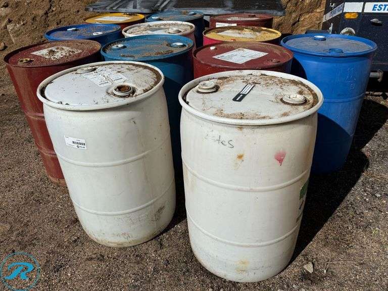 (5) Metal and (7) Plastic Empty 55 Gallon Barrels - Roller Auctions