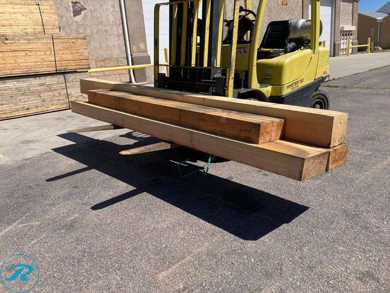 (4) Wood Beams (1) 5.5" x 11.5" x 8ft (1) 8" x 8" x 12ft (2) 5" x 5" x 10ft - Roller Auctions