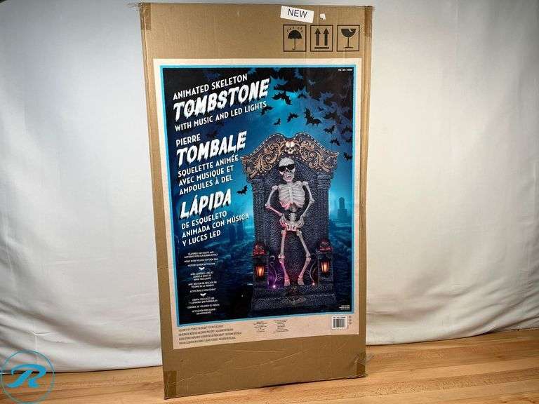 Animated Skeleton Tombstone 3ft W/ Music & LED Lights - New - Roller Auctions