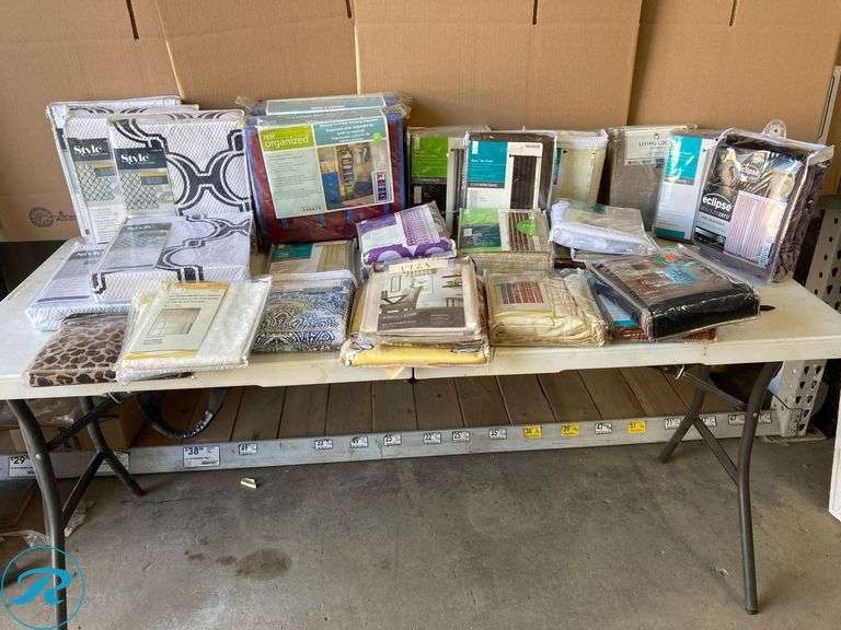 (31) New- Assorted home Supply includes (2) Organizer hanging (6) Shower curtain (19) Rod Pocket panel (different design & color) (4) Back tab valance (different design & color) (see photos) - Roller Auctions