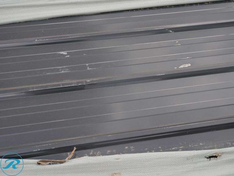 (50) New Sheets SKLP SKL50 Galvalume Steel Siding/Roofing, 12' (Top Panel Damaged) - Roller Auctions