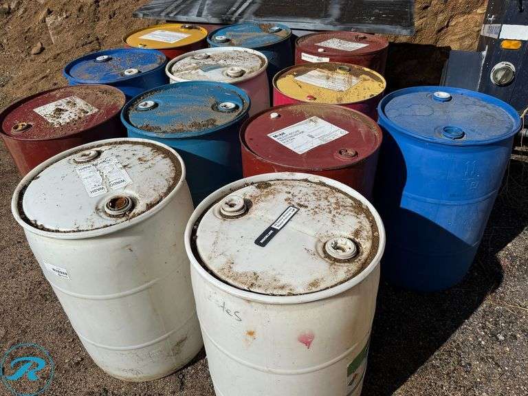 (5) Metal and (7) Plastic Empty 55 Gallon Barrels - Roller Auctions