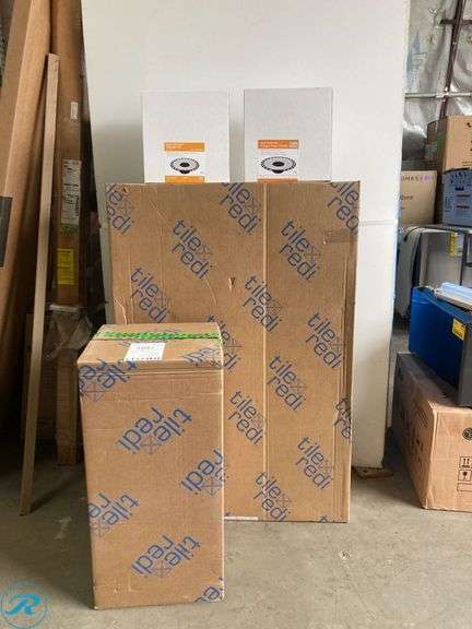 (3) New- (1) Schluter Systems Kerdi-Drain 2-in Black Round Flange (1) Schluter Systems Kerdi-Drain 3-in Grey Round Flange (1) Tile Redi 32-in W x 60-in L Center Made for Tile Single Threshold Rectangle Shower Pan Base Kit with 4.5-in H Threshold - Roller Auctions
