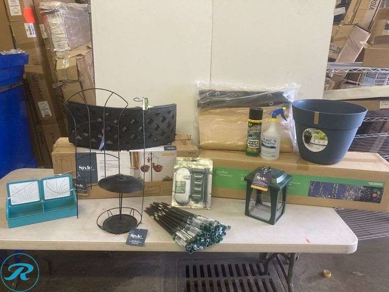 Assorted garden Supplies includes bird feeder, hooks fire ring, planter, vertical garden, power stake fence screen (see photos) - Roller Auctions