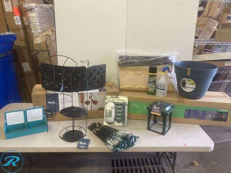 Assorted garden Supplies includes bird feeder, hooks fire ring, planter, vertical garden, power stake fence screen (see photos) - Roller Auctions