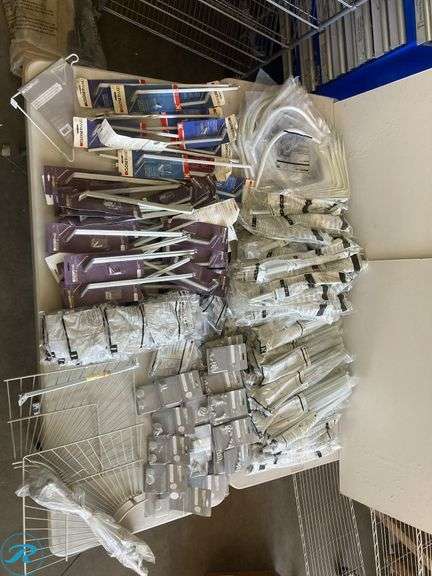 (200+) New Assorted Closet Maid Supplies (includes wire shelves, support brackets, corner round bar, shelving system, rod caps, shelf caps) See photos - Roller Auctions