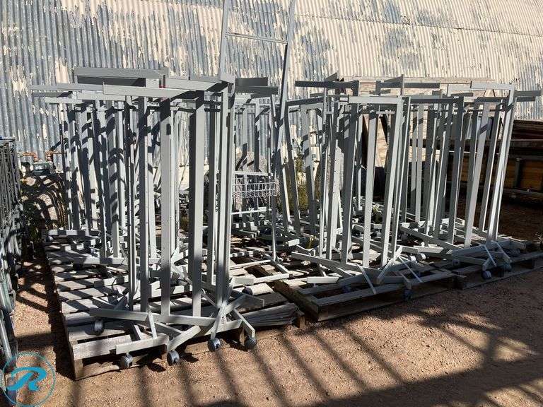 (148) Clothing Racks and supply (shopping carts, smart sign plastic and hooks) - Roller Auctions