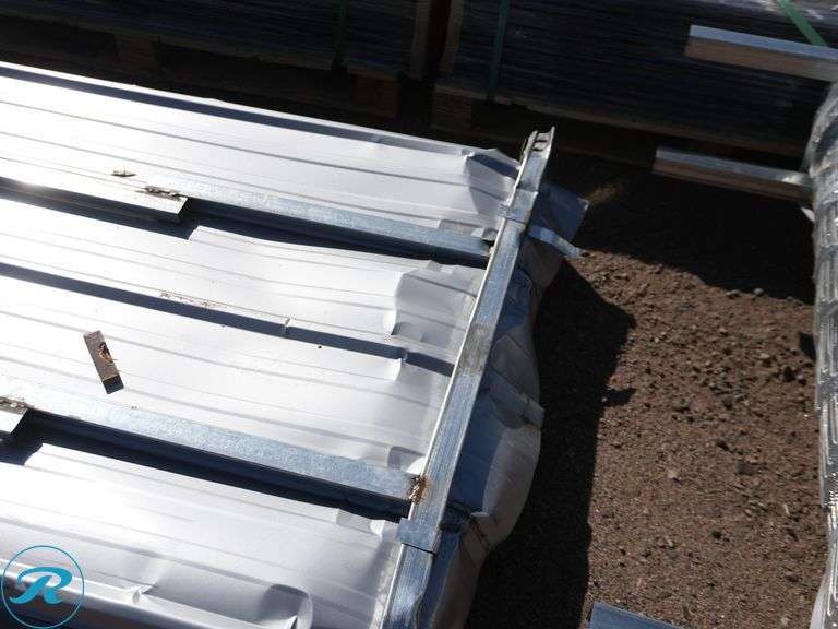 (100) New Sheets of KJ K0311 Galvalume Corrugated Steel Panels, 10' x 35" (Top Few Panels Damaged) - Roller Auctions