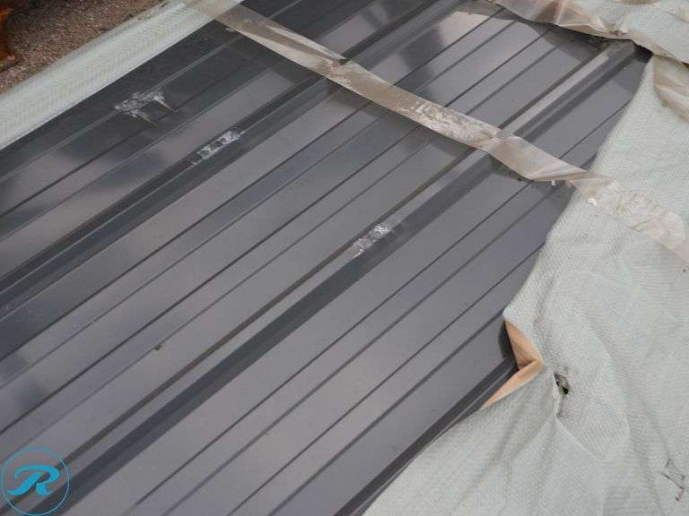(50) New Sheets SKLP SKL50 Galvalume Steel Siding/Roofing, 12' (Top Panel Damaged) - Roller Auctions