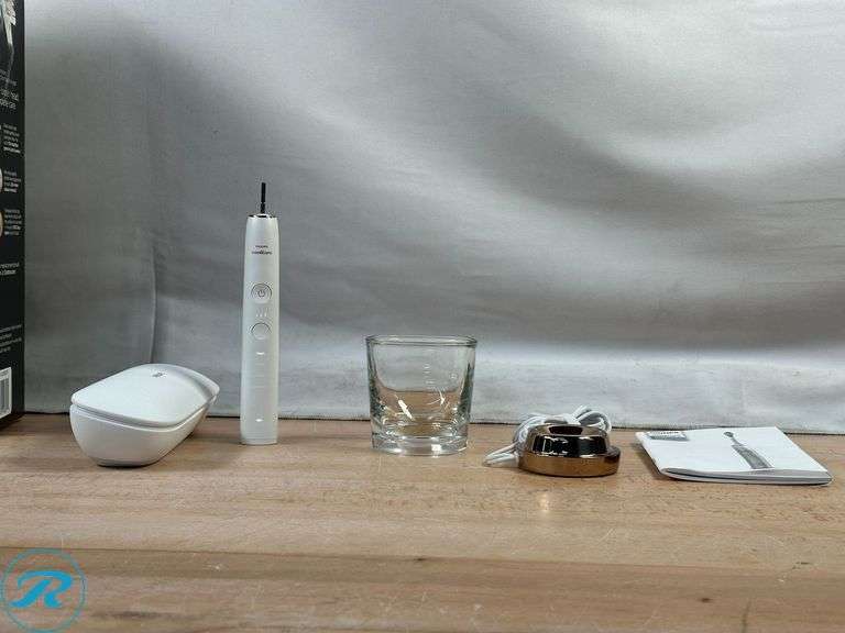 (3) Philips: Sonicare DiamondClean Smart Electric Rechargeable Toothbrush- Like New; Philips: Sonicare Optimal Clean Rechargeable Electric Toothbrush, 2-pack- Like New - Roller Auctions