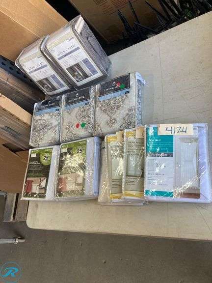 (10) New- Assorted Home Supply Includes (2) curtain panels 50"  x 95"  Charcoal Color Blackout  (3) Curtains Panel 50" x 84" Pattern Design (see photo) (2) Black out Liner Panels 54" x 80" (2) Door Panels  color 59" x 72" (1) Side light door panel 28" x 72" - Roller Auctions
