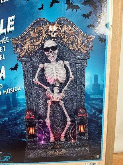 Animated Skeleton Tombstone 3ft W/ Music & LED Lights - New - Roller Auctions
