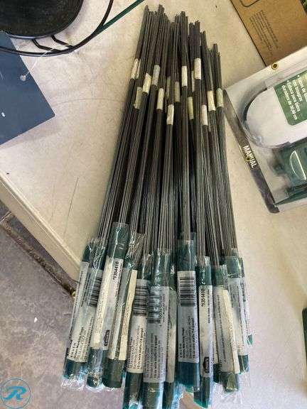 Assorted garden Supplies includes bird feeder, hooks fire ring, planter, vertical garden, power stake fence screen (see photos) - Roller Auctions