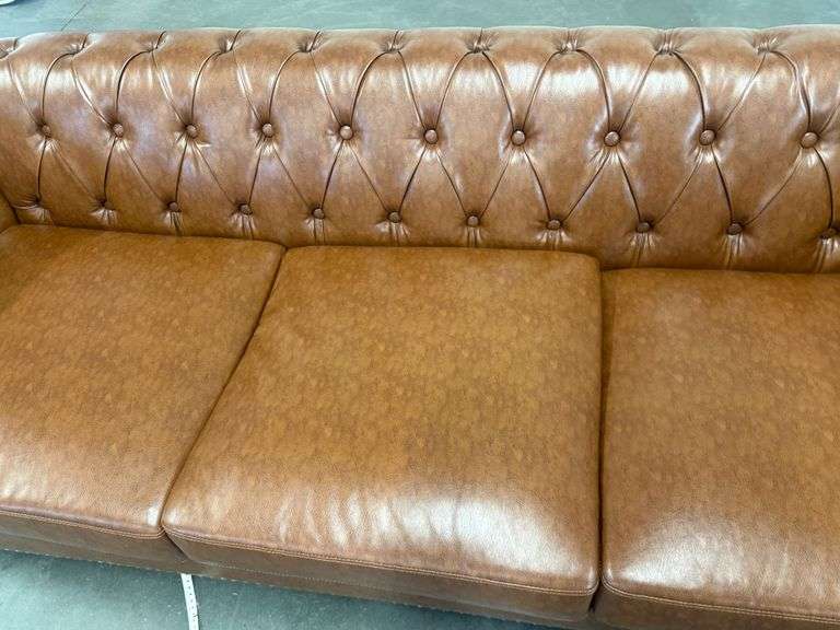 Chesterfield Style Tufted Brown Leather Like Sofa With Rolled Arms And Nailhead Trim, 82in - Roller Auctions