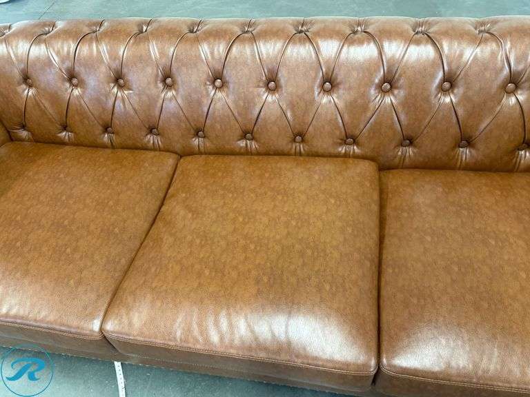 Chesterfield Style Tufted Brown Leather Like Sofa With Rolled Arms And Nailhead Trim, 82in - Roller Auctions